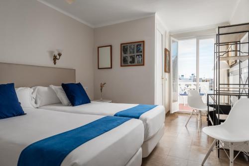 Katil atau katil-katil dalam bilik di Hotel Medium Romantic