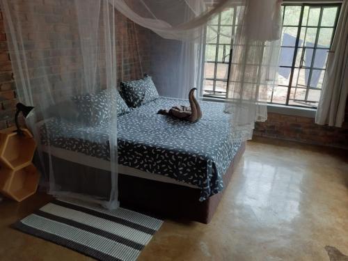 En eller flere senge i et værelse på Marty's Rest