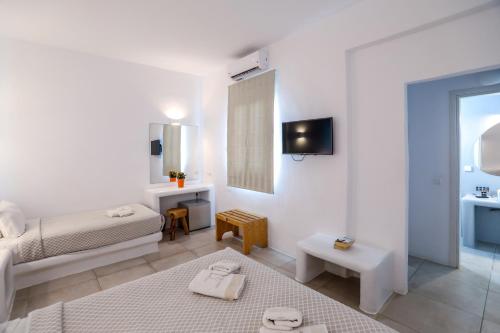 Postel nebo postele na pokoji v ubytování Casa Grande Hotel