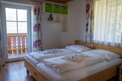 Katil atau katil-katil dalam bilik di Rindis Platzl Apartmenthaus