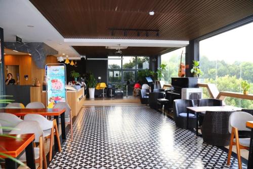 Un restaurant sau alt loc unde se poate mânca la Hotel Stylish Binh Long