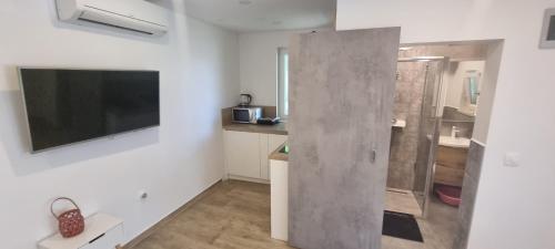 Kuchyň nebo kuchyňský kout v ubytování Villa Mediterranea - Apartments