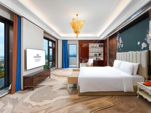 Katil atau katil-katil dalam bilik di Howard Johnson by Wyndham Huaqiao Plaza Xinyu