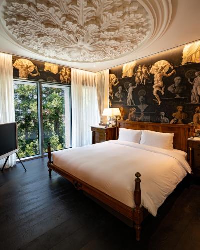 Giường trong phòng chung tại The Siena Resort