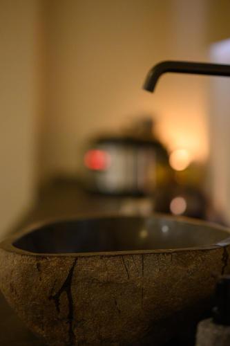 a close up of a sink with a faucet at Pappas Hotel in Loutraki