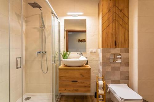 Koupelna v ubytování Apartament C3 Green Resort z Basenem, Sauną, Jacuzzi - 5D Apartments