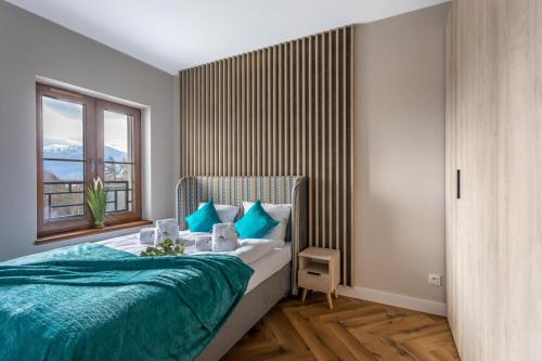 Postel nebo postele na pokoji v ubytování Apartament C3 Green Resort z Basenem, Sauną, Jacuzzi - 5D Apartments