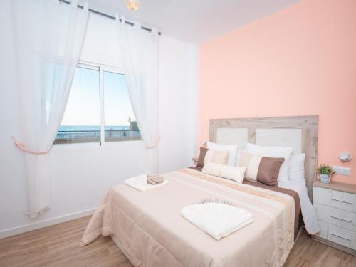 Posteľ alebo postele v izbe v ubytovaní Apartamentos El Calón Playa