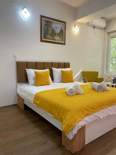 Ένα ή περισσότερα κρεβάτια σε δωμάτιο στο Kamche apartment