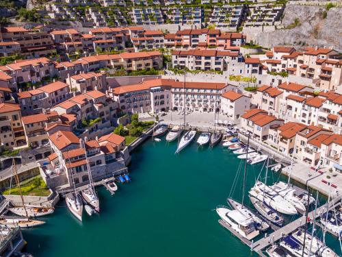 an aerial view of a harbor with boats docked at Portopiccolo Apartments - Zaffiro nel Borgo in Sistiana