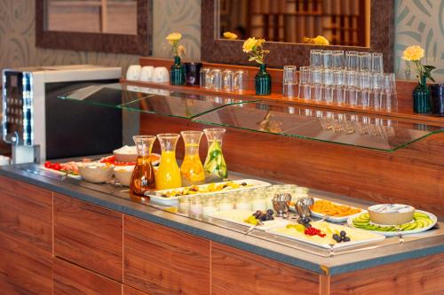 a buffet line with many different types of food at Aspria Hamburg Uhlenhorst Sport & Spa in Hamburg