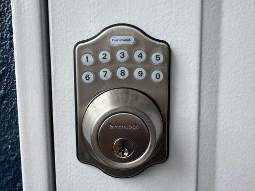 a remote control on a door of a house at OKAERI築地町 in Takamatsu