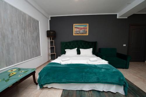 Ένα ή περισσότερα κρεβάτια σε δωμάτιο στο SIA Residence