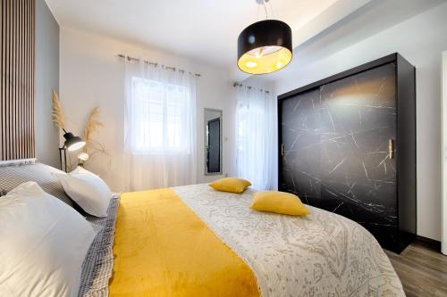 Katil atau katil-katil dalam bilik di Apartments Dubra