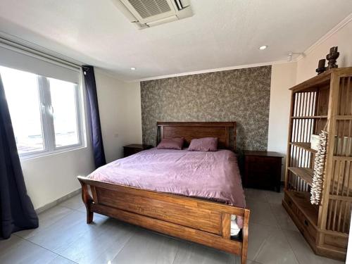 Gulta vai gultas numurā naktsmītnē Executive apartment - Oranjestad
