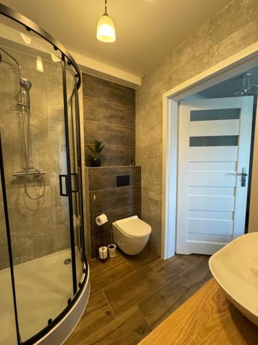 Ένα μπάνιο στο Wieczorek Apartment