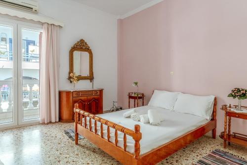 Ένα ή περισσότερα κρεβάτια σε δωμάτιο στο Kleris Apartment 3 Tinos