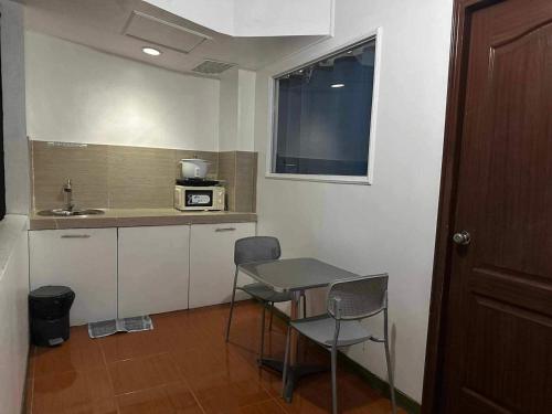 Kuchyň nebo kuchyňský kout v ubytování Big Brother Condotel