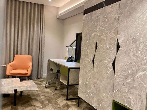 an office with a desk and a chair at Coastlands Skye Hotel, Ridgeside, Umhlanga in Durban