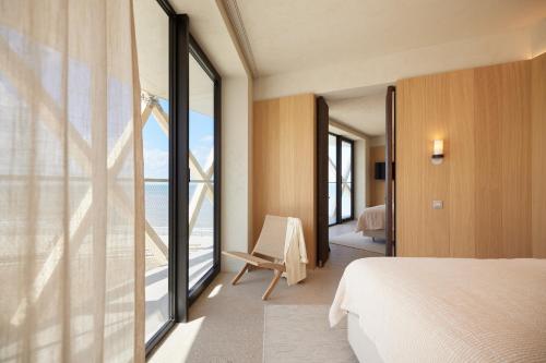 Postel nebo postele na pokoji v ubytování C-Hotels Silt