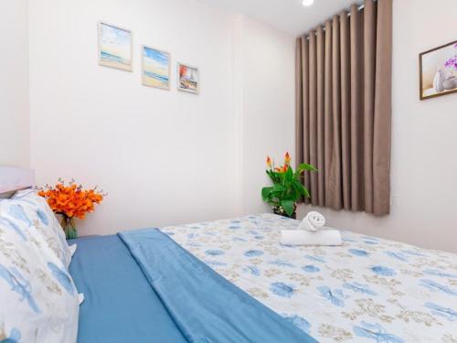 Giường trong phòng chung tại GOLD SEA Vung Tau Apartment -Tina