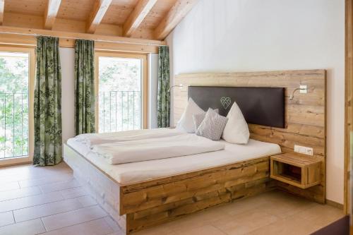 a bedroom with a large bed in a room at Lisas Schröcken in Schröcken