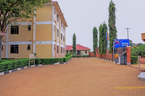 a red brick walkway next to a building at AKELLO HOTEL in Soroti