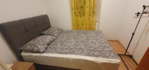 Posteľ alebo postele v izbe v ubytovaní Apartment Kolega