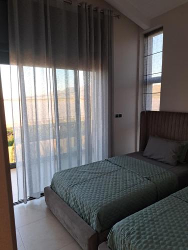 Villa Deluxe Au Pied de l'Atlasにあるベッド