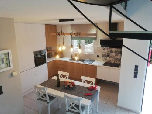 Kuchyň nebo kuchyňský kout v ubytování Jasmin & Olives