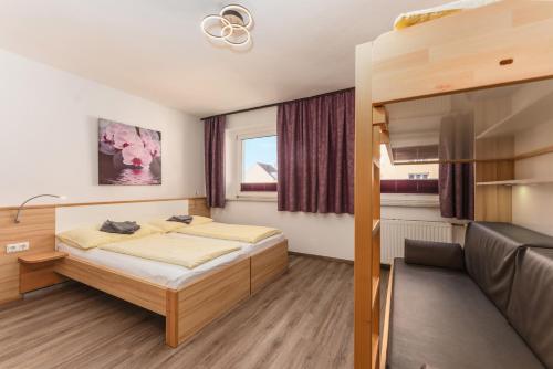 Postel nebo postele na pokoji v ubytování Linz CITY