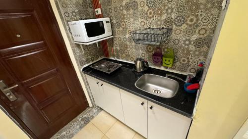 Η κουζίνα ή μικρή κουζίνα στο Relaxing Studio-Malibu El Sokhna Resort