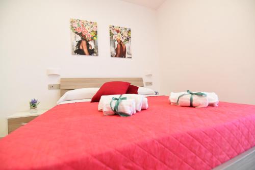 Ένα ή περισσότερα κρεβάτια σε δωμάτιο στο Acunto's Homes