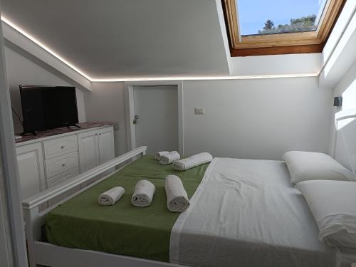 Giường trong phòng chung tại La casa tra i laghi