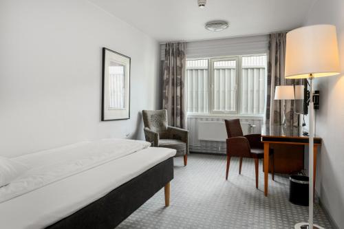 Frichs Hotel Hamarにあるベッド