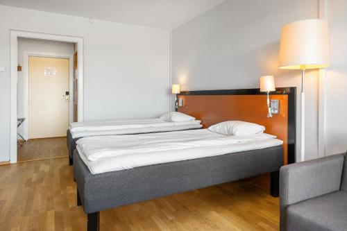 Frichs Hotel Hamarにあるベッド