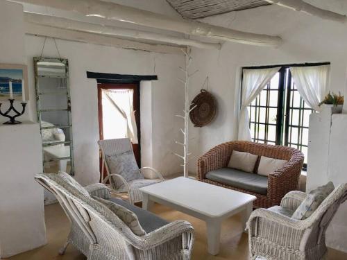 Et opholdsområde på Vlei Cafe Cottage - Vogelgezang Farm