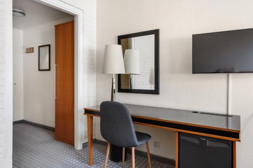 Frichs Hotel Hamarにあるテレビまたはエンターテインメントセンター