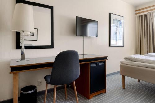Frichs Hotel Hamarにあるテレビまたはエンターテインメントセンター