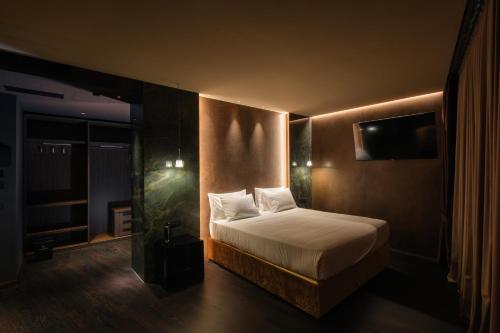Postel nebo postele na pokoji v ubytování Hotel Touring