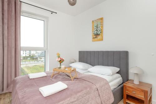 Katil atau katil-katil dalam bilik di Stylish Apartment in Gdynia Balcony & WIFI by Rent like home