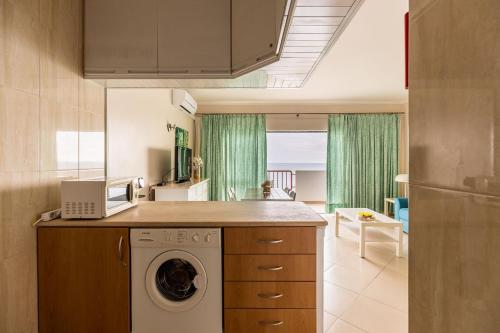 Beachfront 1 BDR Apartment With Pool by LovelyStay