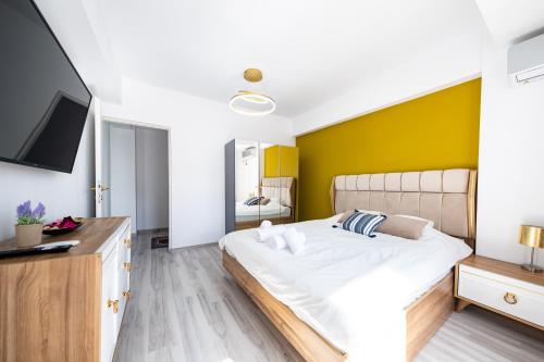 Rúm í herbergi á OLD CITY Ultracentral Calea Victoriei