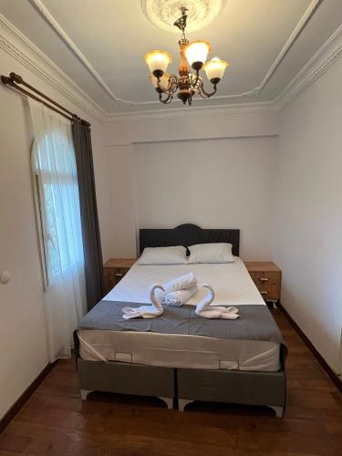 Katil atau katil-katil dalam bilik di Hotel Bella