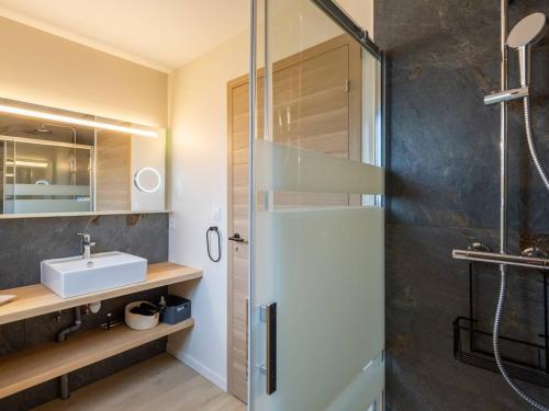 a bathroom with a shower and a sink at Maison Loudenvielle, 4 pièces, 8 personnes - FR-1-695-47 in Loudenvielle