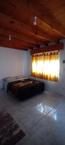 A bed or beds in a room at el pehuén