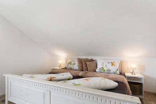 Postel nebo postele na pokoji v ubytování Ferienwohnung In Der Weinig