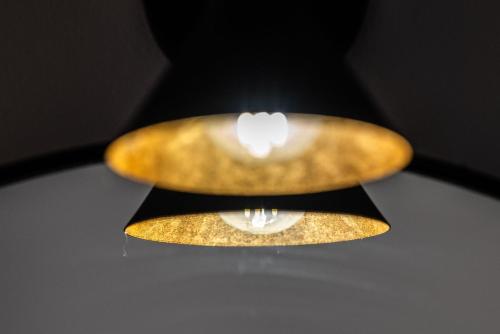 une fermeture d’un dispositif lumineux sur un plafond dans l'établissement Lac Ness - Bel appartment central Part-Dieu, à Lyon