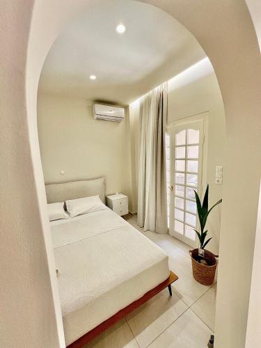 Postel nebo postele na pokoji v ubytování Parakladi unique stay