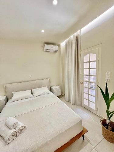 Postel nebo postele na pokoji v ubytování Parakladi unique stay